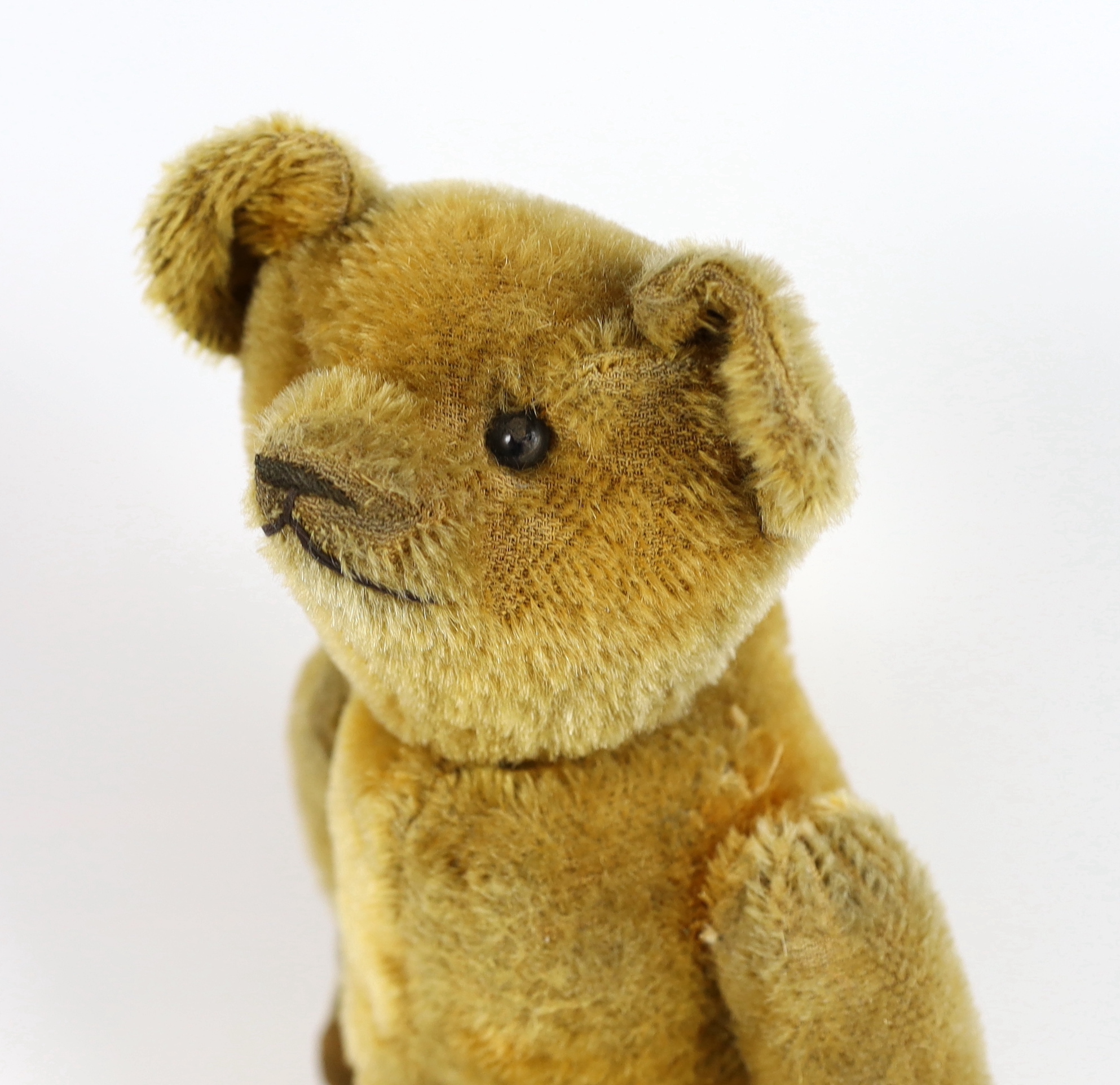 An early bear, possibly American c.1913, 40cm, in good condition, old repairs to paws